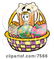 Beer Mug Mascot Cartoon Character In An Easter Basket Full Of Decorated Easter Eggs