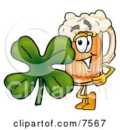 Beer Mug Mascot Cartoon Character With A Green Four Leaf Clover On St Paddys Or St Patricks Day