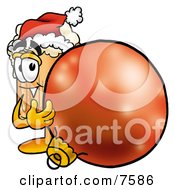 Clipart Picture Of A Beer Mug Mascot Cartoon Character Wearing A Santa Hat Standing With A Christmas Bauble