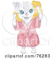 Clean White Cat In A Robe Drying Her Hair