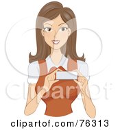 Brunette Businesswoman Holding A Name Tag