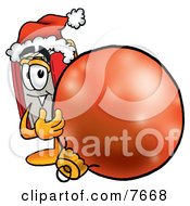 Red Book Mascot Cartoon Character Wearing A Santa Hat Standing With A Christmas Bauble
