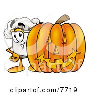 Chefs Hat Mascot Cartoon Character With A Carved Halloween Pumpkin