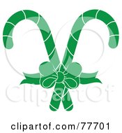 Royalty Free RF Clipart Illustration Of A Bow Tying Together Two Green Christmas Candy Canes by Pams Clipart