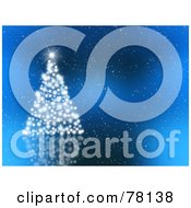 Poster, Art Print Of Sparkly White Light Christmas Tree On A Snowy Blue Background