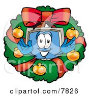 Desktop Computer Mascot Cartoon Character In The Center Of A Christmas Wreath by Mascot Junction