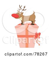 Poster, Art Print Of Rudolph On Top Of A Pink Christmas Present