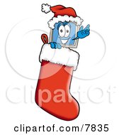 Desktop Computer Mascot Cartoon Character Wearing A Santa Hat Inside A Red Christmas Stocking by Mascot Junction