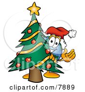 World Earth Globe Mascot Cartoon Character Waving And Standing By A Decorated Christmas Tree