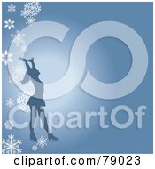 Poster, Art Print Of Silhouetted Female Figure Skater Holding Her Arms Up On A Blue Background With Falling Snowflakes