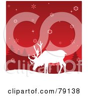 Poster, Art Print Of White Reindeer Silhouette Under A Red Snowflake Sky