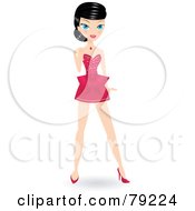 Black Haired Christmas Woman Standing In A Short Pink Dress