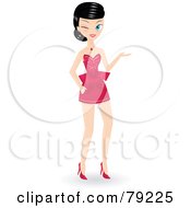 Black Haired Christmas Woman Presenting In A Short Pink Dress