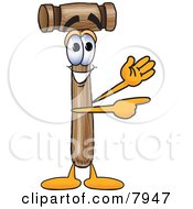 Clipart Picture Of A Mallet Mascot Cartoon Character Waving And Pointing
