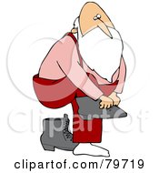 Poster, Art Print Of Father Christmas Lifting One Leg To Put On Boots