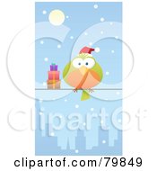 Chubby Green And Orange Christmas Bird Wearing A Santa Hat And Perched By Gifts On A City Wire In The Snow