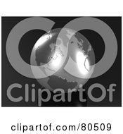 Royalty Free RF Clipart Illustration Of A 3d Computer Generated Shiny Silver Globe On A Black Surface