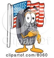 Rubber Tire Mascot Cartoon Character Pledging Allegiance To An American Flag