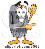 Rubber Tire Mascot Cartoon Character Waving And Pointing