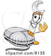 Clipart Picture Of A Wrench Mascot Cartoon Character With A Computer Mouse by Mascot Junction
