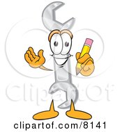Wrench Mascot Cartoon Character Holding A Pencil