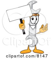 Clipart Picture Of A Wrench Mascot Cartoon Character Holding A Blank Sign