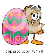 Cardboard Box Mascot Cartoon Character Standing Beside An Easter Egg