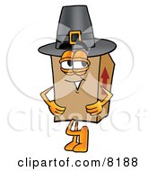 Cardboard Box Mascot Cartoon Character Wearing A Pilgrim Hat On Thanksgiving by Toons4Biz