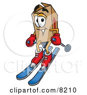 Clipart Picture Of A Cardboard Box Mascot Cartoon Character Skiing Downhill by Toons4Biz