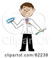 Friendly Male Dentist Holding A Toothbrush And Toothpaste