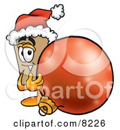 Poster, Art Print Of Cardboard Box Mascot Cartoon Character Wearing A Santa Hat Standing With A Christmas Bauble