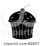 Royalty Free RF Clipart Illustration Of A Cherry On Top Of A Black And White Cupcake With Sprinkles
