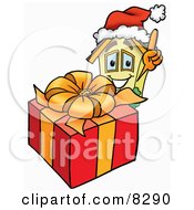 Poster, Art Print Of House Mascot Cartoon Character Standing By A Christmas Present