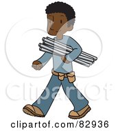 Male African American Plumber Walking And Carrying Pipes