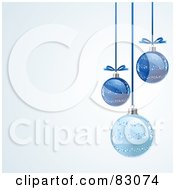 Royalty Free RF Clipart Illustration Of Three Blue Glitter Christmas Baubles Suspended Over A Gradient Blue And White Background