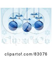 Poster, Art Print Of Shiny Light And Dark Blue Christmas Baubles With Bows Suspended Over A Blue Snowflake Background