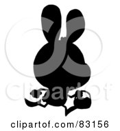 Poster, Art Print Of Solid Black Silhouette Of An Egg Hunting Bunny