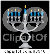 Silver Jewish Menorah With Nine Blue Lit Candles On A Black Background