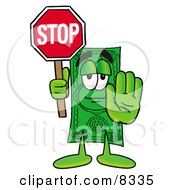 Dollar Bill Mascot Cartoon Character Holding A Stop Sign by Toons4Biz