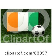 Royalty Free RF Clipart Illustration Of A 3d Soccer Ball Resting In The Grass In Front Of A Reflective Ivory Coast Flag