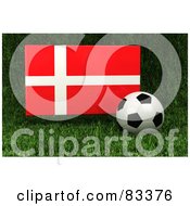 Poster, Art Print Of 3d Soccer Ball Resting In The Grass In Front Of A Reflective Denmark Flag