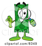 Dollar Bill Mascot Cartoon Character Looking Through A Magnifying Glass