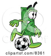 Dollar Bill Mascot Cartoon Character Kicking A Soccer Ball