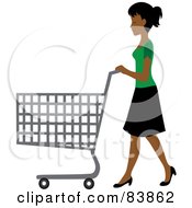 Indian Woman Pushing An Empty Shopping Cart In A Store