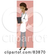 Hispanic Female Doctor Looking Down At Charts