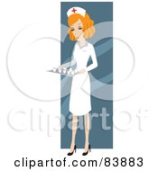 Red Haired Caucasian Female Nurse Carrying A Tray Of Meds