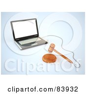 Auction Gavel In Front Of A Laptop Computer