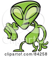 Angry Green Alien Pointing Outwards