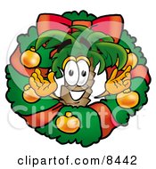 Palm Tree Mascot Cartoon Character In The Center Of A Christmas Wreath