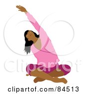 Middle Eastern Woman Sitting Cross Legged On The Floor And Stretching While Doing Yoga